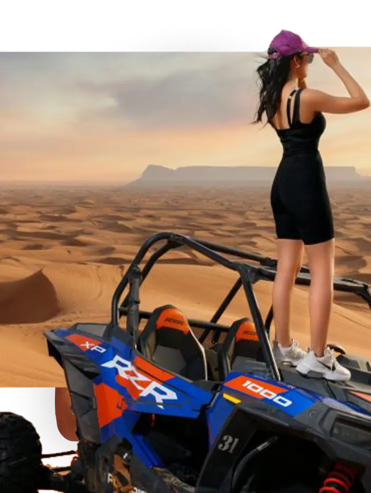 Tourist enjoying Dubai desert safari adventure at sunset